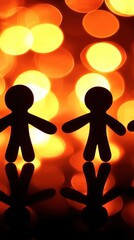 Paper people silhouettes, warm light bokeh background, celebration, possible use greeting card, social media