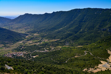 Naklejka premium View of the village and the Pyrenees from the Château de Peyrepertuse, Languedoc, France / ペルペルテューズ城から見た村とピレネー山脈 ラングドック フランス