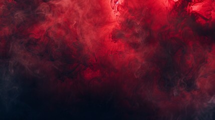 Obraz premium Enigmatic swirl of vibrant red smoke drifting against a deep black backdrop, perfect for bold wallpapers and dramatic backgrounds.