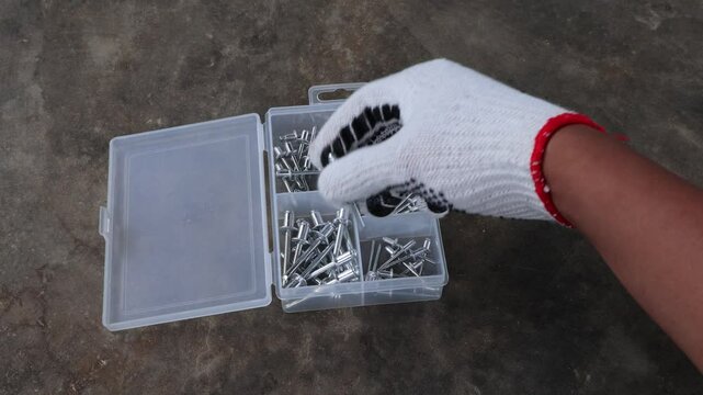 Pick up rivets nails in plastic storage