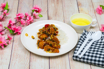 DEEP fried fish with herb & spicy sauce with rice