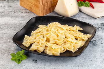 Italian pasta Farfalle with oil