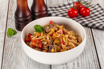 Asian udon noodles with beef