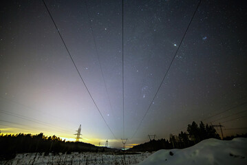 High-voltage power lines above the starry sky, near the village of Laya (a suburb of Nizhny Tagil)....