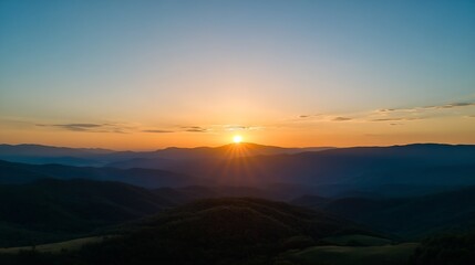 Obraz premium Breathtaking mountain ranges at sunrise with a beautiful golden glow : Generative AI