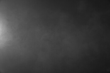 black and white background with smoke