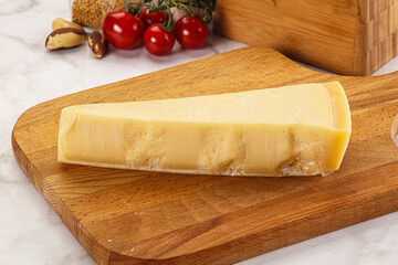 Hard parmesan cheese piece triangle