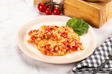 Shakshuka with tomato for breakfast