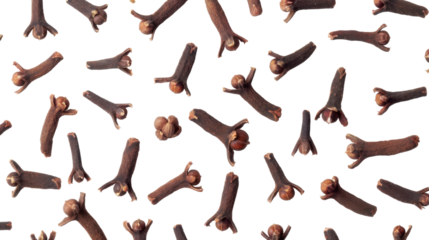 Dried cloves falling on transparent background: spice pattern for culinary designs