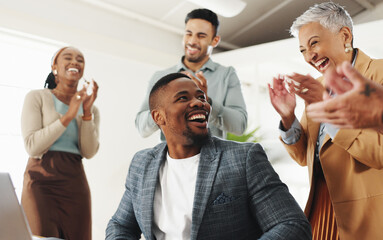 Man, celebration and team with applause by laptop for notification, deal or success in modern...