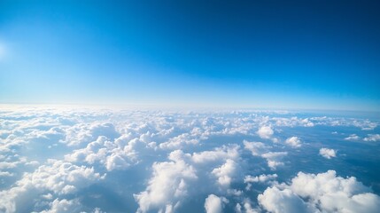 Naklejka premium Stunning Aerial View of Clouds Under a Bright Blue Sky from Airplane Window : Generative AI