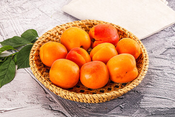 Raw ripe sweet apricots heap