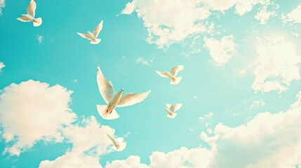 White Birds Soaring in a Bright Blue Sky with Puffy Clouds