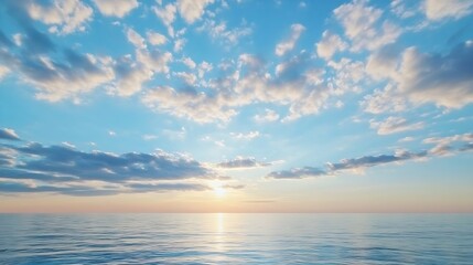 Naklejka premium Wideangle view of the ocean at sunset with a colorful sky and fluffy clouds in the horizon : Generative AI