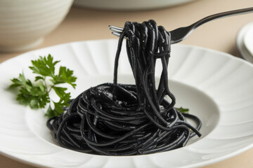 Spaghetti with black sepia, with squid ink