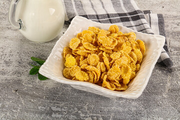 Corn flakes with milk for breakfast