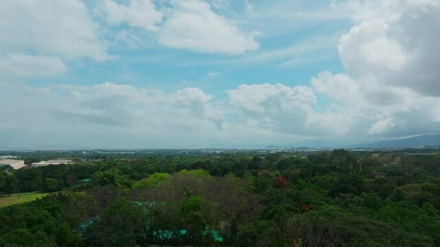 Aerial view of the dense green vegetation and rural buildings in Calamba, Laguna, The Philippines