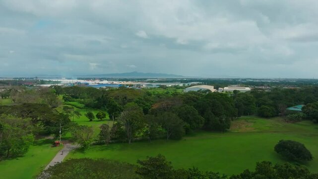 Aerial view of the dense green vegetation and rural buildings in Calamba, Laguna, The Philippines