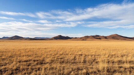 Stunning Vast Plains with Gentle Rolling Mountains Under a Blue Sky : Generative AI