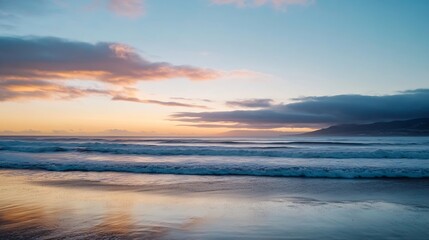 Obraz premium Serene sunset over ocean waves with soft clouds and vibrant sky : Generative AI
