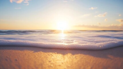 Fototapeta premium Golden sunlight casting a warm glow over gentle ocean waves lapping at the sandy beach at sunrise : Generative AI
