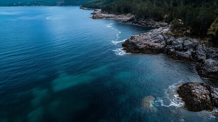 Fototapeta premium Stunning coastal view featuring clear blue waters and rocky shoreline surrounded by forested hills : Generative AI
