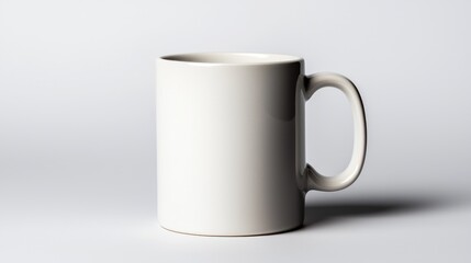 Fototapeta premium Empty white coffee mug studio setting product photography minimalist background close-up perspective branding opportunities