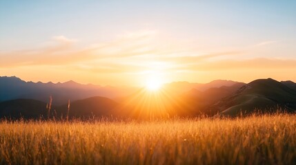 Stunning Sunset Over Mountain Peaks Illuminating a Golden Field with Tall Grasses and a Peaceful Atmosphere : Generative AI