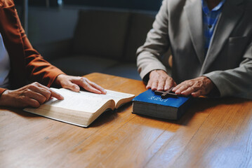 Christians are congregants join hands to pray and seek the blessings of God
