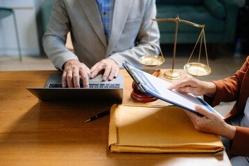 Two lawyers are discussing about contract paper, law matters determination, pointing.law