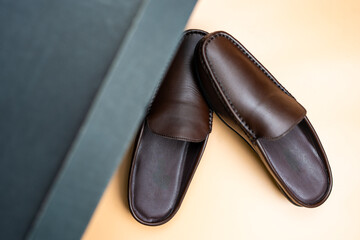 A pair of brown leather loafers,  perfect for a stylish and sophisticated look.