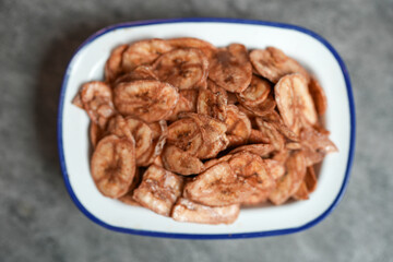Fried banana chips. Crispy banana chips. Thai fruit snack