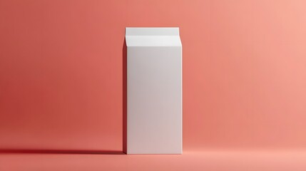 A white carton stands on a salmon colored background
