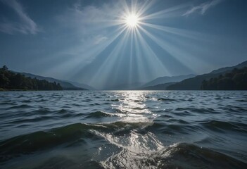 A lake with wavy water reflecting the sunbeams during sunset, surrounded by a green and windy plain