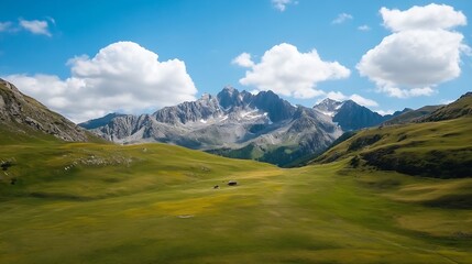 Fototapeta premium Breathtaking panoramic view of mountain peaks and lush green fields under a clear blue sky : Generative AI