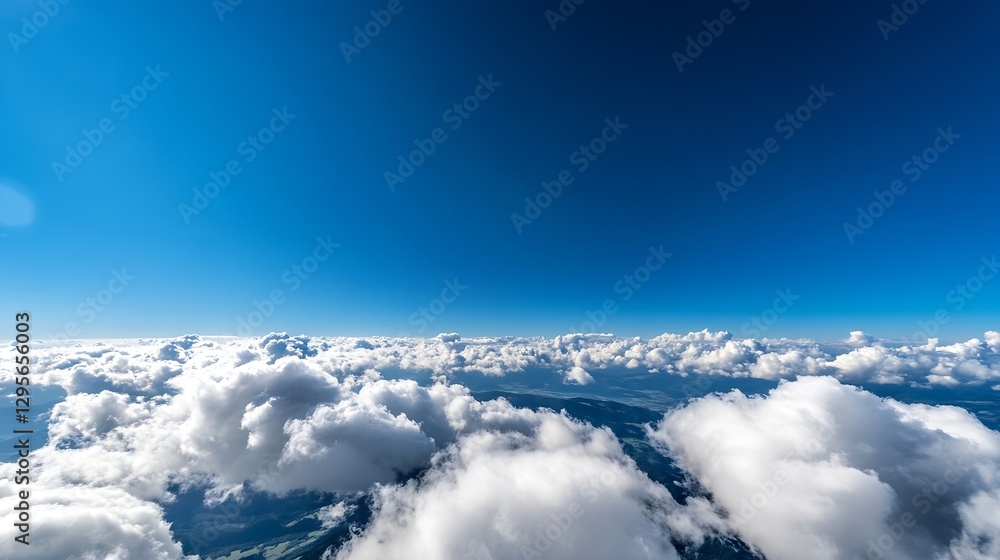 Poster expansive blue sky with fluffy white clouds captured from high above the earth : generative ai