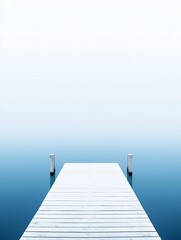 Fototapeta premium empty wooden pier extending into misty waters, sense of infinity, poetic and meditative, soft muted colors, tranquil atmosphere, dreamlike minimalism, nature s solitude, gentle reflections,