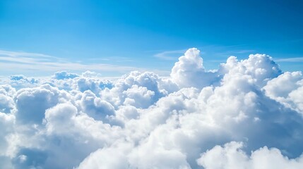 Fototapeta premium Captivating aerial view of fluffy clouds in a bright blue sky creating a serene and peaceful atmosphere : Generative AI