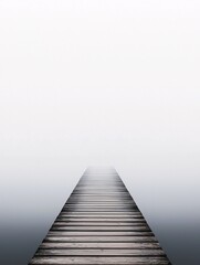 Fototapeta premium empty wooden pier extending into misty waters, sense of infinity, poetic and meditative, soft muted colors, tranquil atmosphere, dreamlike minimalism, nature s solitude, gentle reflections,