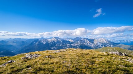 Fototapeta premium Breathtaking panoramic view of mountain landscape under clear blue skies for nature lovers and adventurers : Generative AI