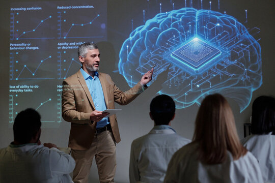Side view portrait of senior man giving presentation on microchip brain implants pointing at virtual data projections futuristic advanced neurology copy space