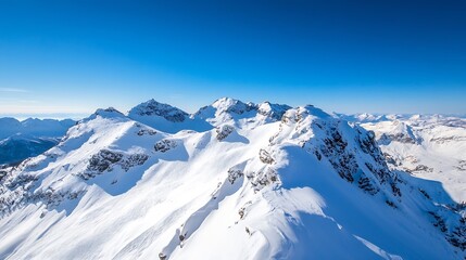 Breathtaking view of snow capped mountains under a clear blue sky in a serene winter landscape : Generative AI