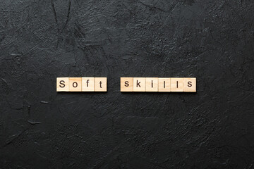 soft skills word written on wood block. soft skills text on table, concept