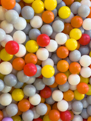 Colorful assortment of plastic balls fills play area in a recreational facility