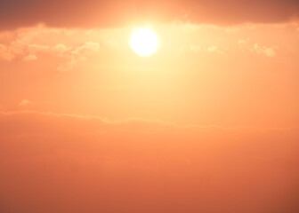 Stunning Sunset with Golden Sky and Clouds Creating a Serene and Tranquil Atmosphere Perfect for Relaxation and Inspiration