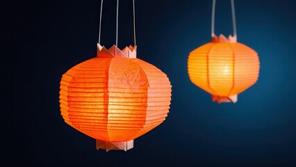 Obraz premium enchanting orange lanterns illuminate a serene blue backdrop