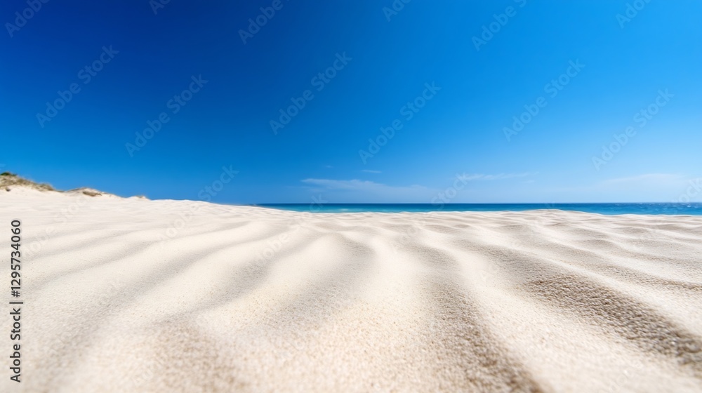 Aufkleber stunning sandy beach with clear blue sky and calm ocean view creating a serene coastal landscape : g