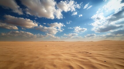 Naklejka premium Expansive desert landscape featuring golden sand dunes under a dramatic sky filled with clouds and sunlight : Generative AI