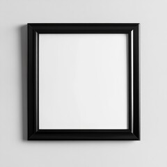 Fototapeta premium Elegant Black Frame Mockup on White Wall, Perfect for Displaying Art or Photos in Home Decor Setting.