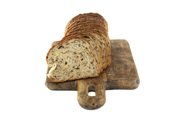 Whole Grain Bread Loaf Slices on Rustic Wooden Cutting Board